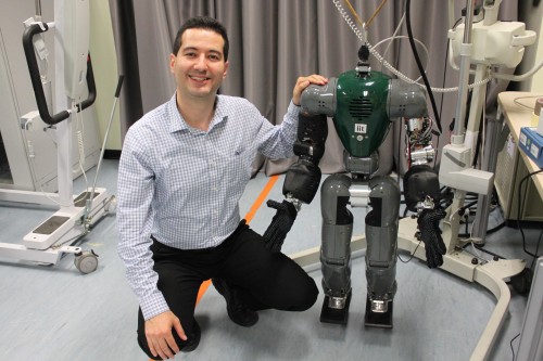 Petar with the robot COMAN developed at the Advanced Robotics department of IIT